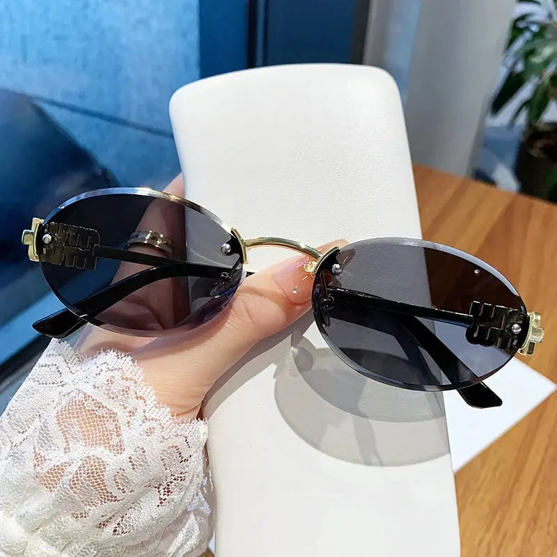 Oval Frame Sunglasses New Rimless Cut Edge Personality Glasses Fashion Design Sense Small Frame Sunglasses 90289